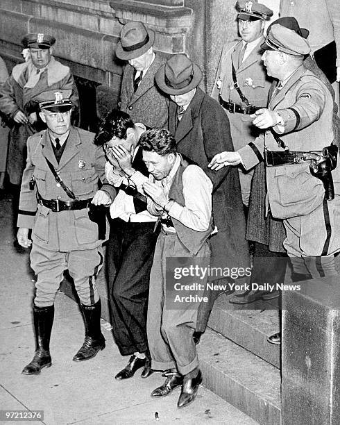 After their attempted jail break, John Oley and Harold Crowley are escorted by the police to the Syracuse railway station for a trip to Albany.