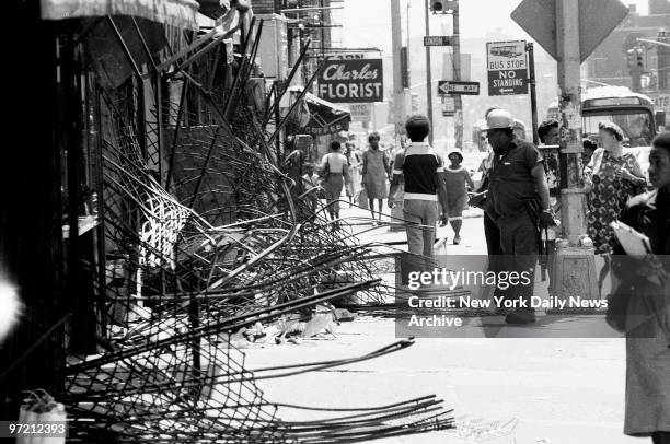 Aftermath of 1977 blackout power failure -- Storefront gates failed to keep out looters -- at Utica and Union St. And Eastern Parkway in Brooklyn,...