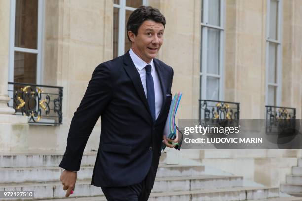 French Government's Spokesperson Benjamin Griveaux leaves the Elysee Palace after attending the weekly cabinet meeting in Paris on June 12, 2018.