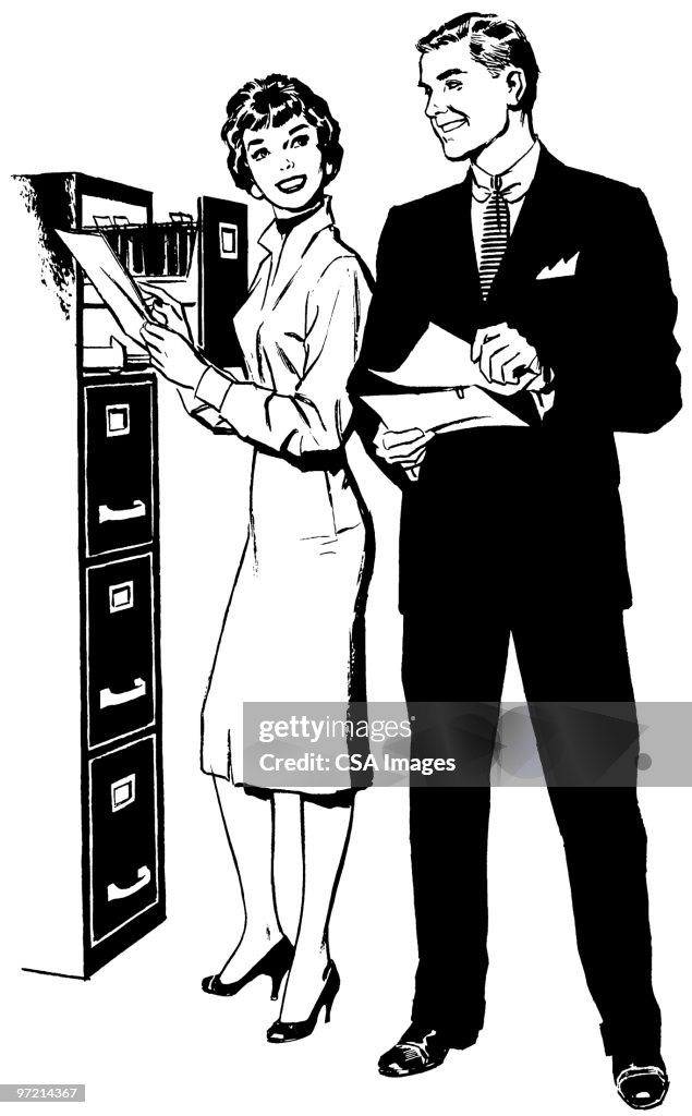 Man and Woman at File Drawer