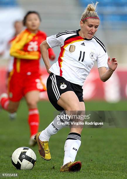 Anja Mittag of Germany in action during the Woman Algarve Cup match between Germany and China at the Estadio Algarve on March 1, 2010 in Faro,...