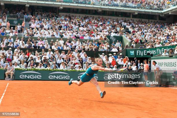 June 9. French Open Tennis Tournament - Day Twelve. Simona Halep of Romania in a action against Sloane Stephens of the United States on Court...