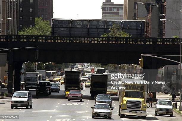 Section of the 1.5-mile High Line, an abandoned elevated spur built 70 years ago to carry freight to Manhattan's West Side, crosses 10th Ave. At 30th...