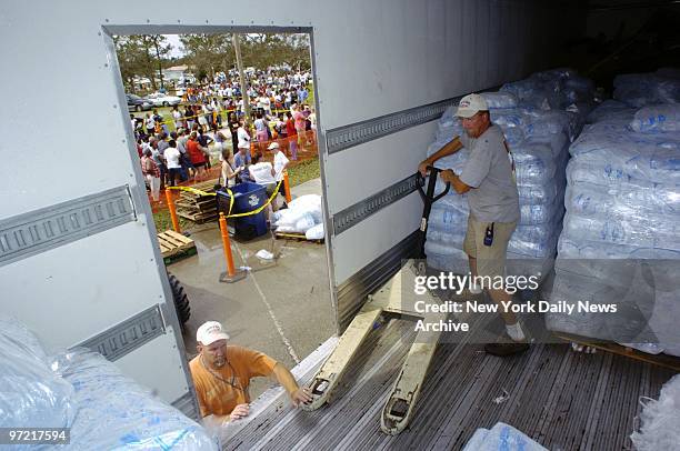 Shipment of ice is delivered to the Long Wood Recreation Center in Fort Pierce after Hurricane Frances walloped South Central Florida.