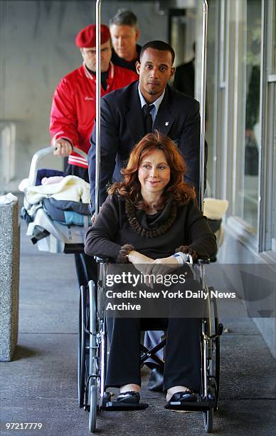 Smiling Aleta St. James is wheeled from Mount Sinai Medical Center shortly after noon as brother Curtis Sliwa follows, carrying her two newborns. St....