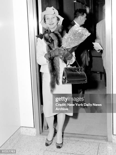 Bright Vivien Leigh arrives at International Airport from London, where she discussed a divorce with her husband, actor Sir Laurence Olivier. Asked...