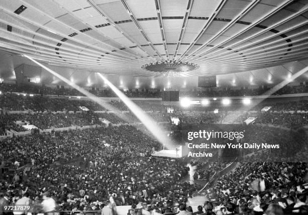 Record crowd of 19,959 jams Madison Square Garden for the Finals of the Golden Gloves. In the spotlight are two of the hopefuls clashing for crowns...