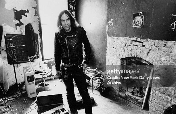 Squatter, George Marco, standing firm in his E. 9th St. Home.