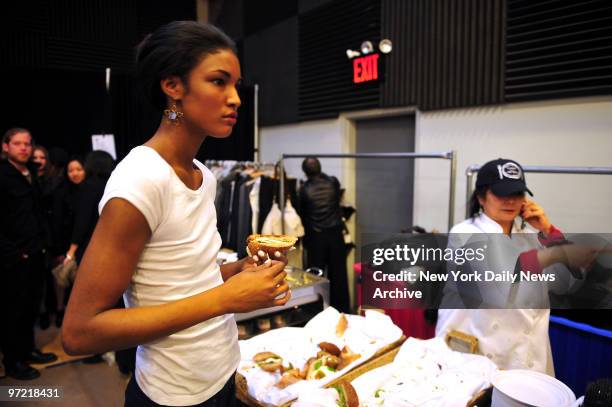 Pm Model Sessilee Lopez looks for a bite to eat backstage at the Rag and Bone show during the first day of fashion week 2009.