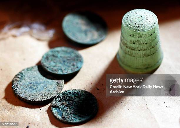 Thimble and some coins are among the personal belongings of a family that was murdered during the Holocaust. Rabbi Michael Schudrich has returned the...