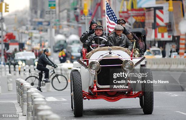 Thomas Flyer leads a pack of classic autos into Times Square for a recreation of the starting line from the 1908 Great Race. This year marks the...