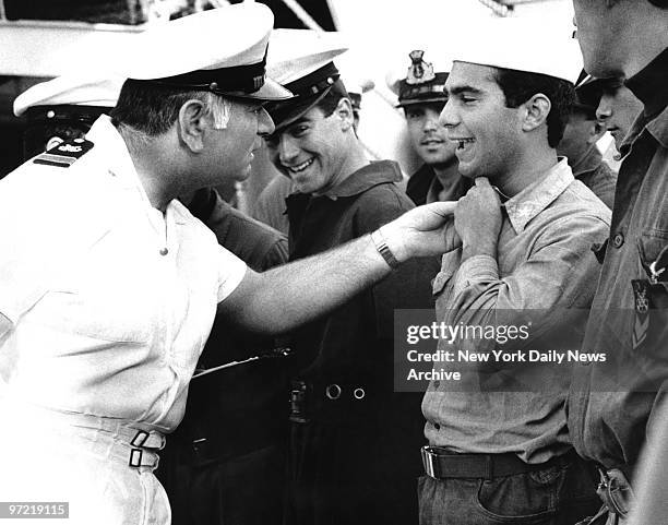 Bit of laughter during the daily routine of Master Chief Petty Officer Mario Garuti aboard the Amerigo Vespucci.