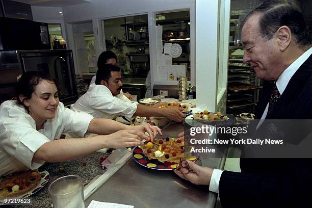 Day in the life of Cirio Maccioni owner of Le Cirque 2000. Cirio checks on pastry.