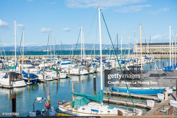 boats in the docks at pier 39, san francisco, united states - fishermans wharf stock pictures, royalty-free photos & images