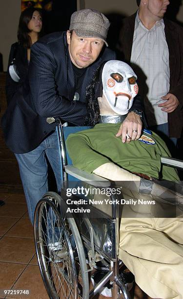 Actor Donnie Wahlberg gets together with a stuffed Halloween character in a wheelchair at a Stuff Magazine Halloween party to celebrate the special...