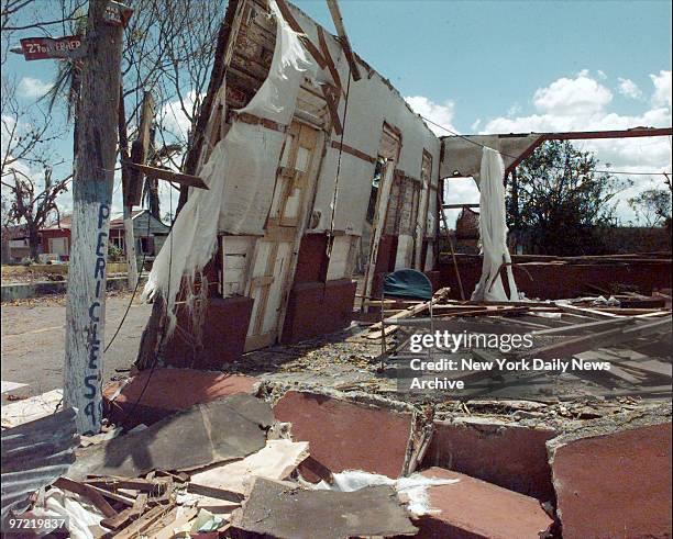 Chair is all that remains inside house in Ramon Santana after Hurricane Georges swept through the Dominican Republic.