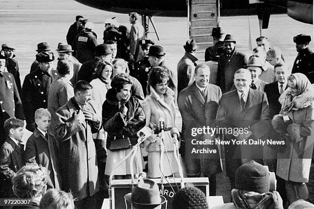 Crowd at LaGuardia Airport's Marine Terminal welcomes the crew of Apollo 8 to New York. Standing left to right are Bill and Valerie Anders, Marilyn...