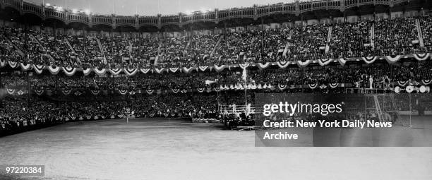 Crowd of 52,448 filled Yankee Stadium for international bout between Golden Gloves champions and Italian national team on June 9, 1937. The Italian...