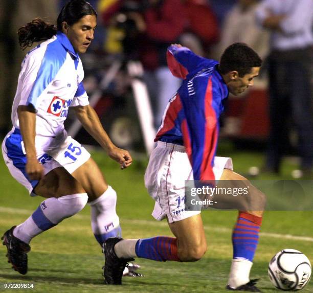 Jorge Campos , of Cerro Porteno of Paraguay, is blocking Francisco Palencia. Of Cruz Azul of Mexico, 10 May 2001 in Asuncion, Paraguay, in part of...