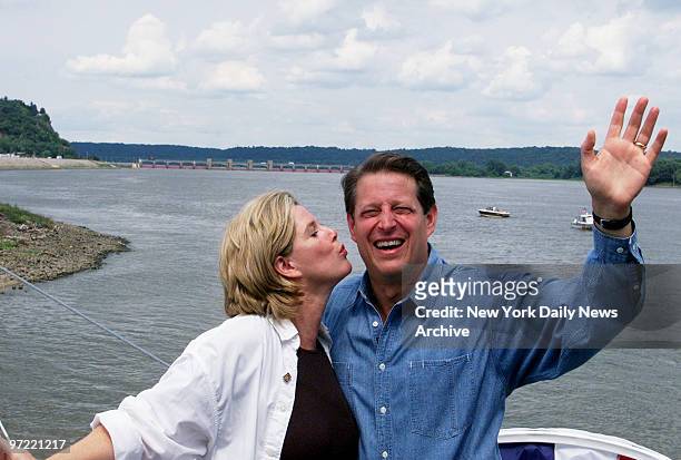 Al Gore gets a kiss from his wife, Tipper, during a stop in Dubuque, Iowa, on a four-day campaign trip down the Mississippi River that will end in...