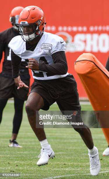 Defensive back Denzel Ward of the Cleveland Browns takes part in a drill during an OTA practice on May 30, 2018 at the Cleveland Browns training...