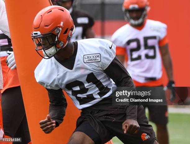 Defensive back Denzel Ward of the Cleveland Browns takes part in a drill during an OTA practice on May 30, 2018 at the Cleveland Browns training...