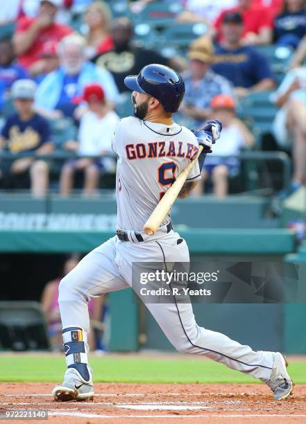 Marwin Gonzalez of the Houston Astros hits in the second inning against the Texas Rangers at Globe Life Park in Arlington on June 8, 2018 in...
