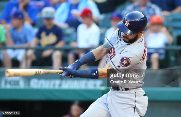 Marwin Gonzalez of the Houston Astros hits in the second inning against the Texas Rangers at Globe Life Park in Arlington on June 8, 2018 in...