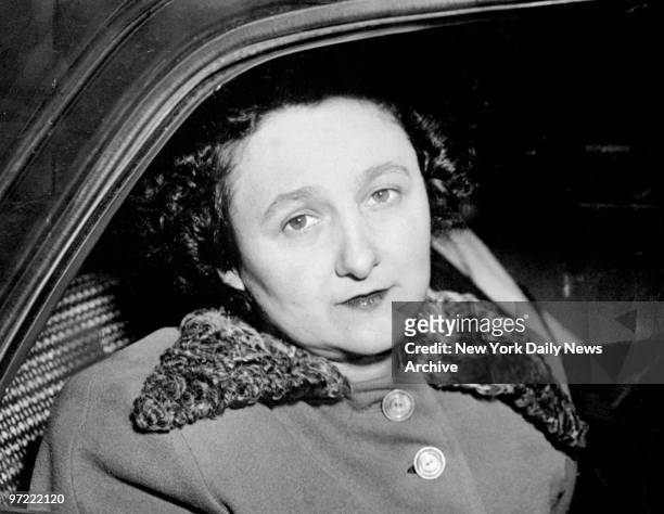 Accused spy Ethel Rosenberg looks out of a U.S. Marshall's car.