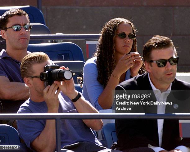 Actor Alec Baldwin watches as brother William focuses on the action as Todd Martin beat Cedric Pioline in the semi-finals at the U.S. Open.