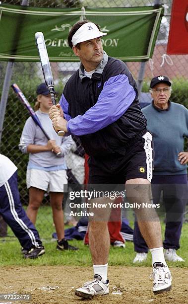 Actor Alec Baldwin waits for the pitch at the 51st annual Artists & Writers annual softball game in East Hampton, L.I.