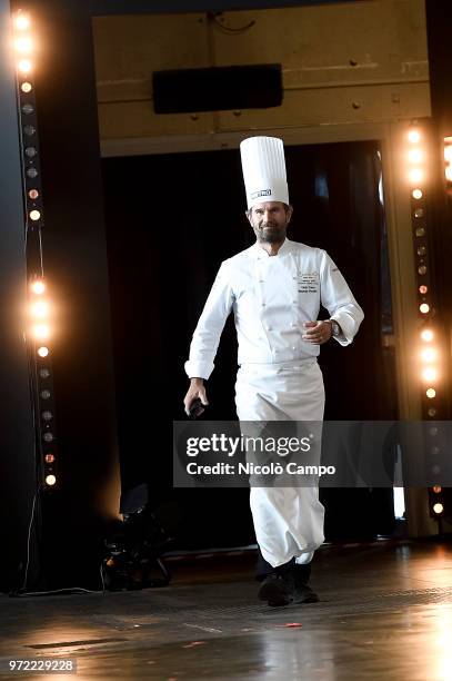 President of honour Carlo Cracco greets the audience during the Europe 2018 Bocuse d'Or International culinary competition. Best ten teams will...