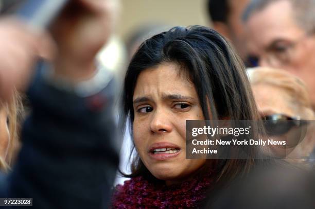 Alejandra St. Guillen, sister of slain grad student Imette St. Guillen, cries while outside Brooklyn Supreme Court where Darryl Littlejohn was...