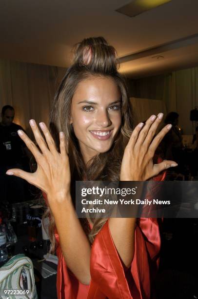 Alessandra Ambrosio shows off her manicure backstage as she prepares for the Victoria's Secret Fashion Show at the Lexington Ave. Armory.