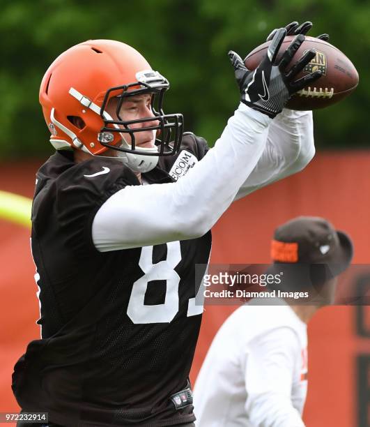 Tight end Seth DeValve of the Cleveland Browns catches a pass during an OTA practice on May 30, 2018 at the Cleveland Browns training facility in...