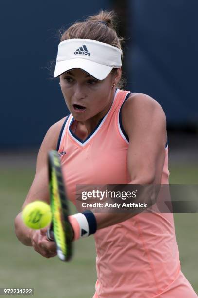 Anna Kalinskaya of Russia hits a backhand during her Ladies Singles, first round match against Kirsten Flipkens of Belgium on day two of the Libema...