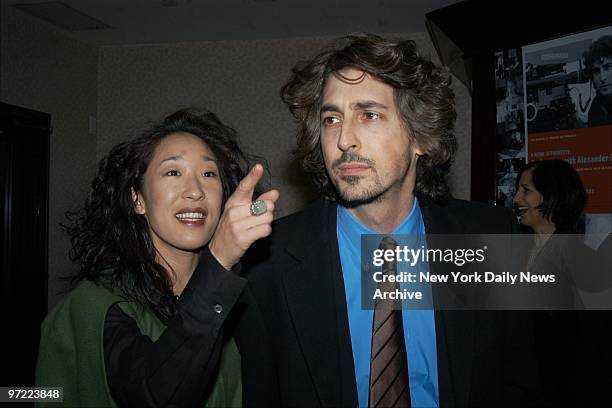 Alexander Payne and his wife, actress Sandra Oh, arrive for "A Work in Progress: An Evening With Alexander Payne" hosted by MoMA Film at the Gramercy...