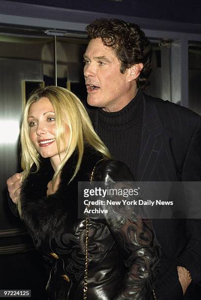 Actor David Hasselhoff and his wife, actress Pamela Bach, arrive for a screening of the movie "What Women Want" at the Paris Theater.