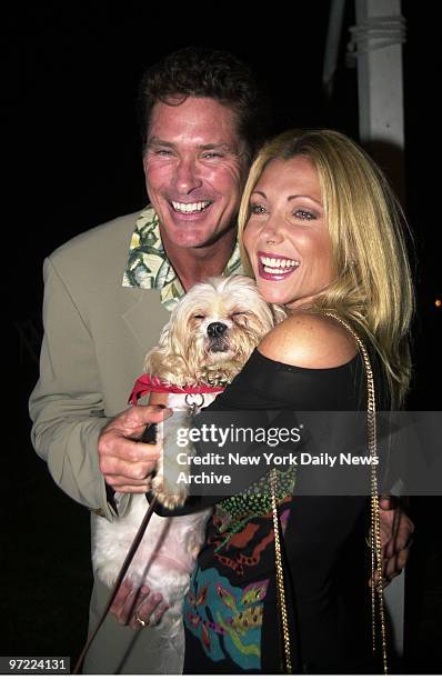 Actor David Hasselhoff and wife Pam pamper a pooch in need of a home at the Bow Wow Luau, a benefit for the Animal Rescue Fund of the Hamptons, in...