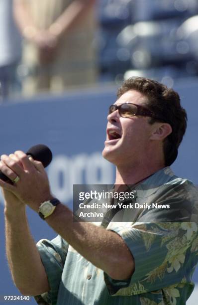 Actor David Hasselhoff sings the national anthem before start of womens' semifinal match between Serena Williams and Martina Hingis at the U.S. Open...