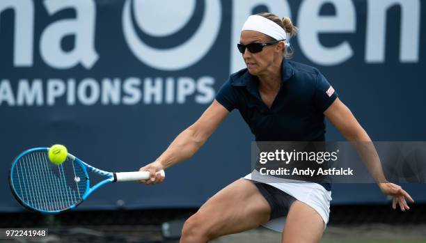 Kirsten Flipkens of Belgium hits a backhand during her Ladies Singles, first round match against Anna Kalinskaya of Russia on day two of the Libema...