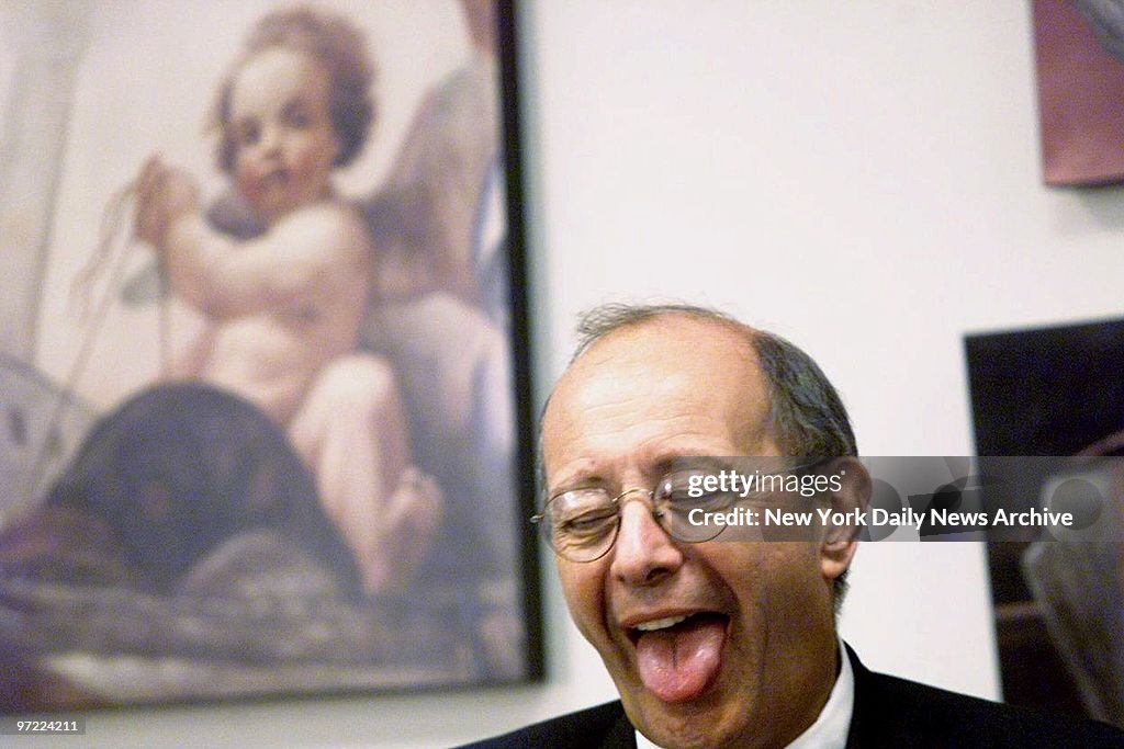Alfonse M. D'Amato sticks out his tongue.