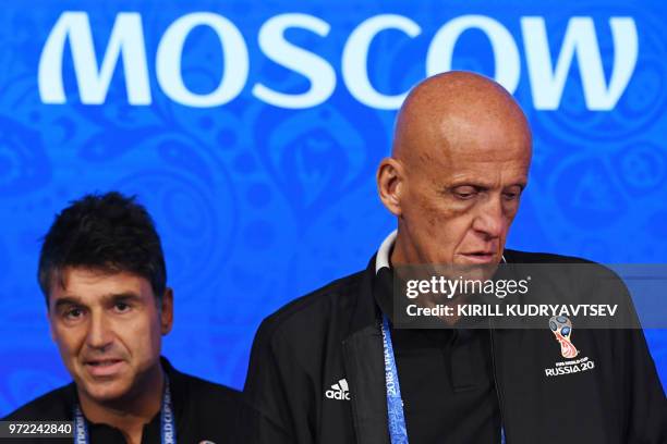 Chairman of the FIFA Referees Committee Pierluigi Collina and FIFA Director Refereeing Massimo Busacca attend a press conference in the Luzhniki...