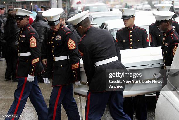 Marine honor guard carries the coffin of Nixzmary Brown inside St. Mary's Church on Grand St. For her funeral service. The 7-year-old girl was found...