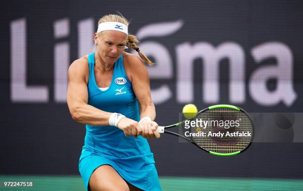 Kiki Bertens of the Netherlands in action against Natalia Vikhlyantseva of Russia on Day Two of the Libema Open 2018 on June 12, 2018 in Rosmalen,...