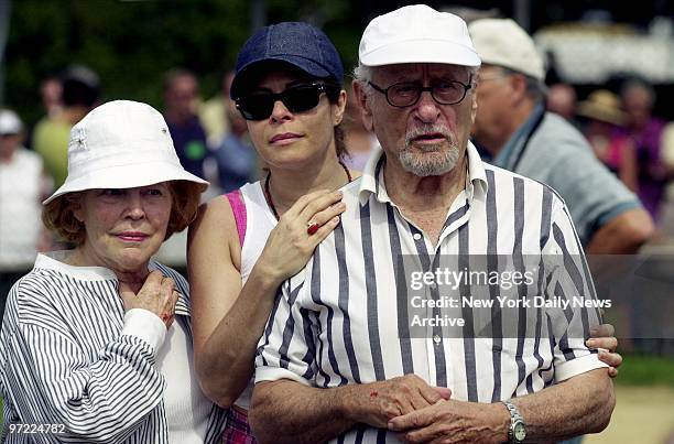 Actor Eli Wallach is joined by wife Anne Jackson and their daughter, Roberta Wallach, at a writers and artists softball game in East Hampton, L.I.