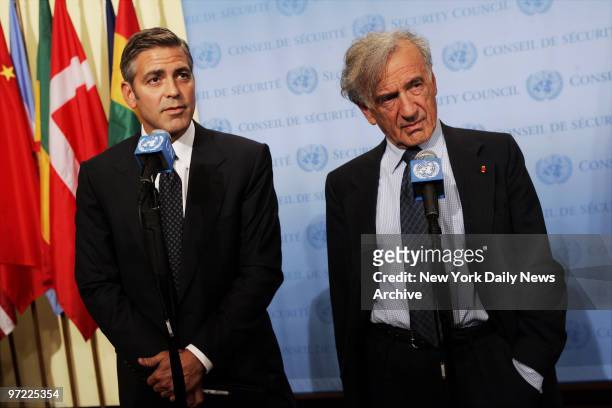 Actor George Clooney and Nobel Peace Prize winner Elie Wiesel speak to the media after addressing the United Nations Security Council on the crisis...