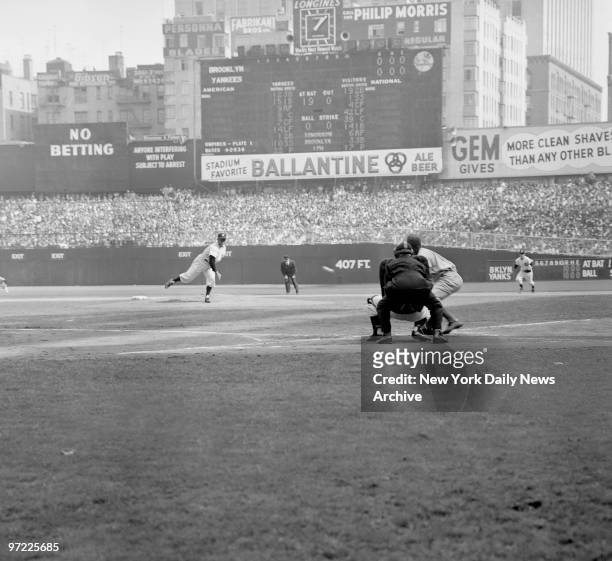 Allie Reynolds of the Yankees at the start of Game 1 of the World Series, pitching to the National League Rookie of the Year, Dodgers second baseman...