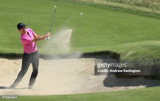 Paul Casey of England plays a shot from a bunker during a practice round prior to the 2018 U.S. Open at Shinnecock Hills Golf Club on June 12, 2018...