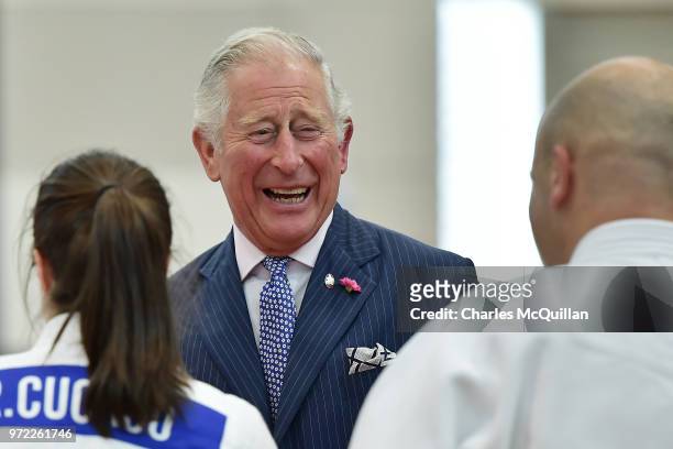 Prince Charles, Prince of Wales is treated to a judo display during a visit to Ulster University's Colraine Campus on June 12, 2018 in County...